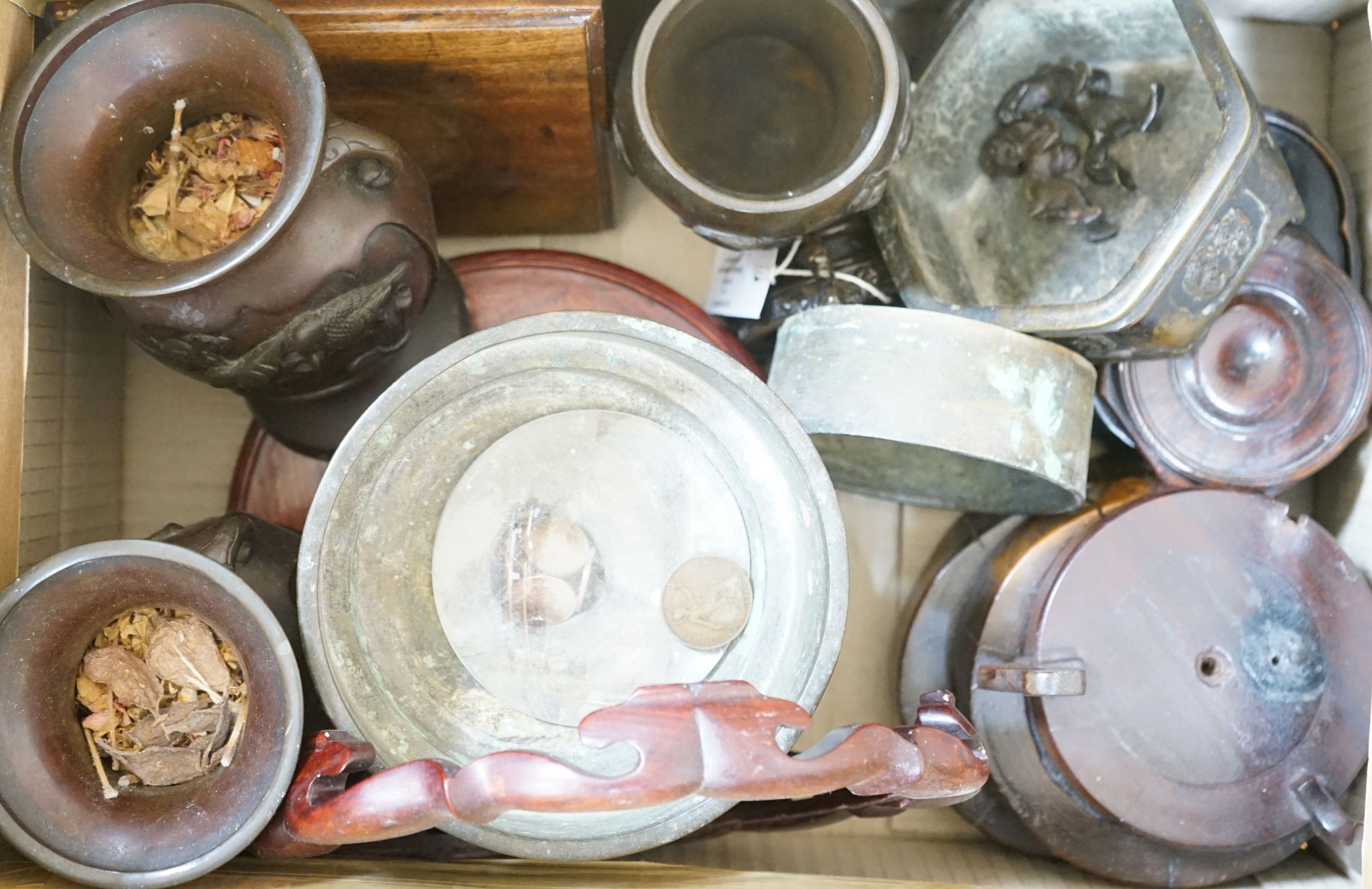 A group of Japanese bronze vases and sundry hardwood stands